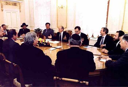 Jun. 2003: Russian President Vladimir Putin meets with Russian Chief Rabbi Berel Lazar, and American Jewish leaders, including NCSJ Chairman Dr. Robert J. Meth (second from left).